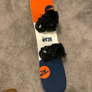 New never used kids snowboard and boots